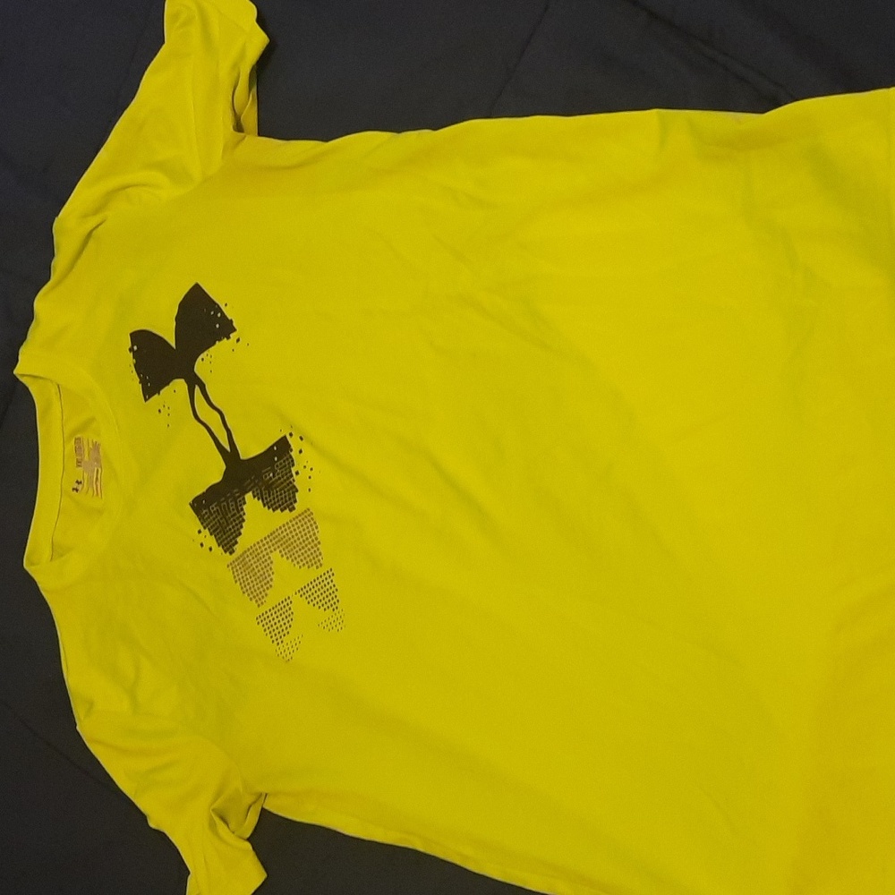 Florescent yellow under armor shirt.